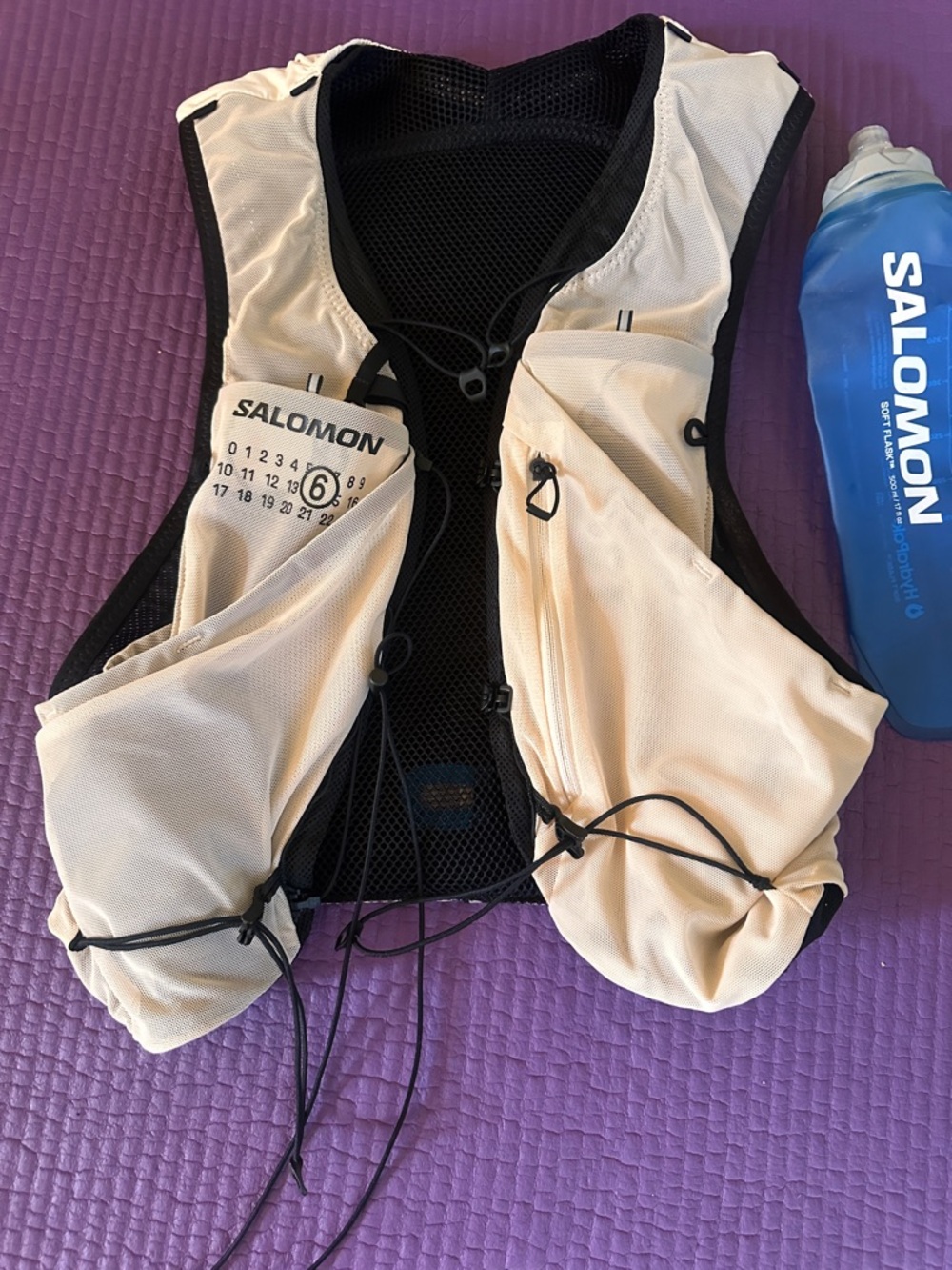 Salomon x   MM6 Margiela cream and black hydration pack